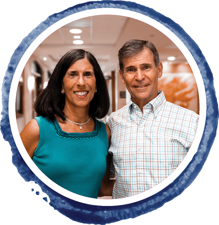 Honorees in a deep blue watercolor circle frame.